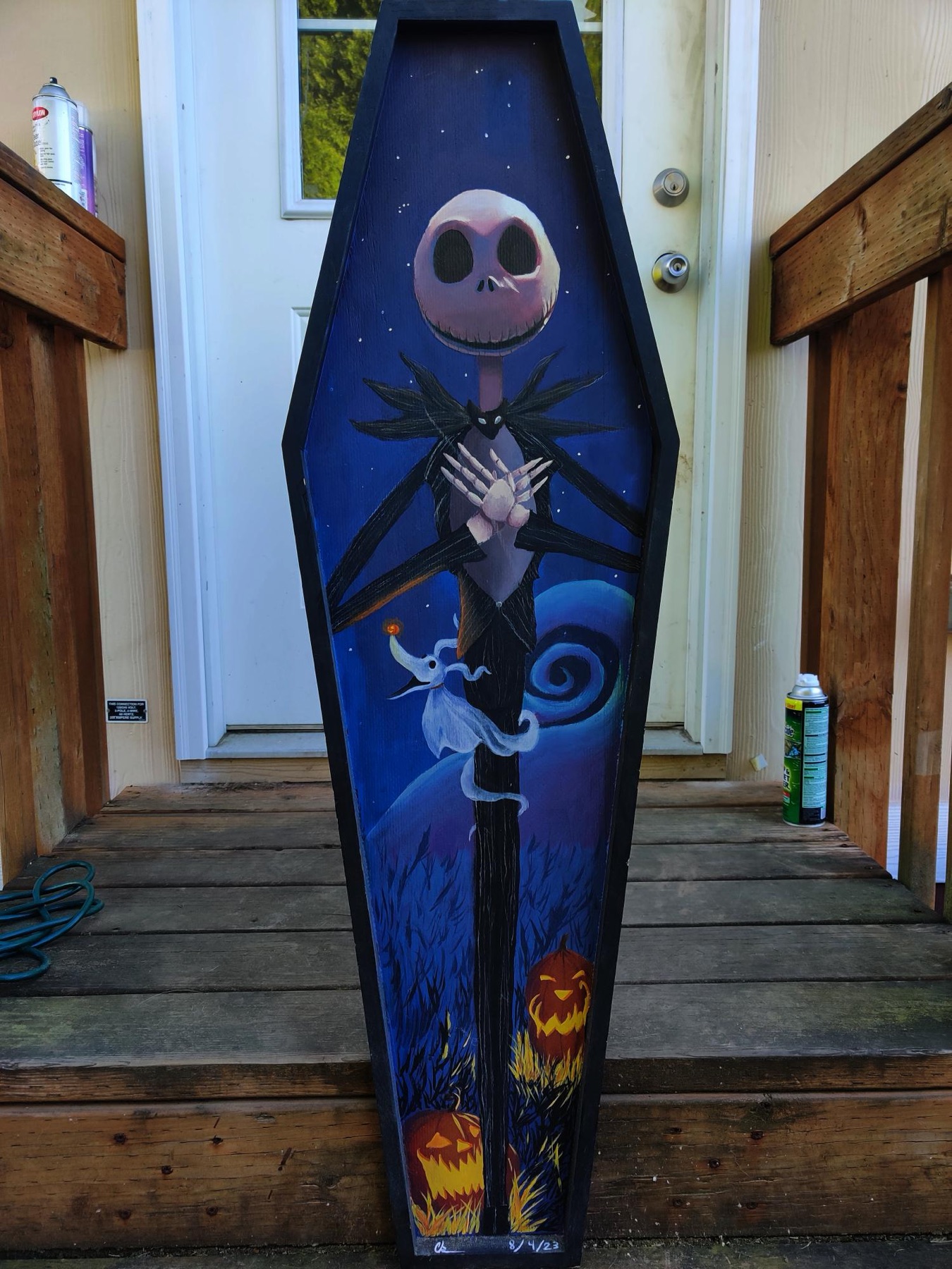 Jack Skellington coffin painting displayed against a doorway