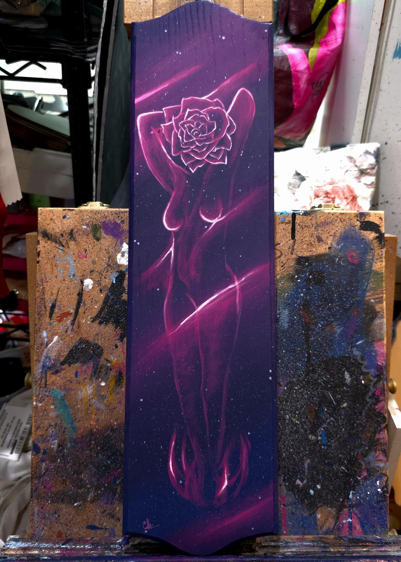 Rose Woman original with a pink line-art rose figure on a dark purple board
